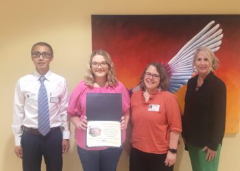 Representatives of Tusculum University, Greeneville High School join Eady Wright for the scholarship presentation. Left to right are Dr. Wei Hu, assistant professor of mathematics; Eady; Dr. Heather Henson-Ramsey, dean of the College of Science, Technology and Mathematics; and DeAnna Martin, Greeneville High School’s principal.