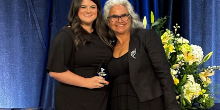 Mrs. Swinney is on the left and Ms. Lizzette Reynolds, Tennessee Commissioner of Education, is on the right.