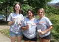 Left to right, Isabella Clawson, Tania Roque Castro and Hailey Diana enjoy a float during Pioneer WOW.