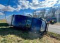 Tractor Trailer Overturns, Driver Uninjured