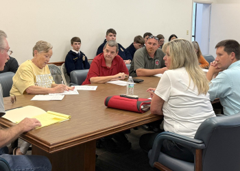 Members of the Greene County Animal Control Committee listen as Arnold Hensley speaks about loud barking coming from an animal rescue near his neighborhood during a meeting Thursday.