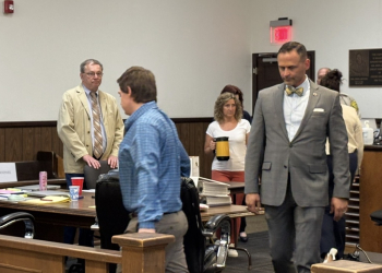Defendant Jordan Allen (in blue shirt) and his attorney Todd Estep return to the courtroom after the lunch break.