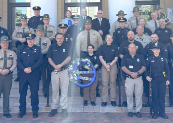 Local peace officers pose for a photo on the steps of the Greene County Courthouse after a ceremony Tuesday marking National Peace Officers Memorial Day and National Police Week.