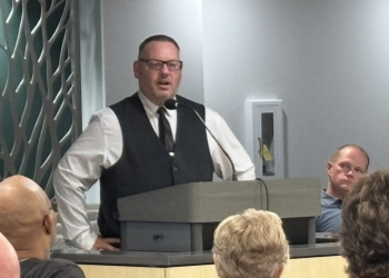 Brad Mattern addresses (L-R) Bill Dabbs, Robin Quillen, Jan Kiker and other County Commissioners Tuesday evening.  To his left is Commissioner-elect E.J. Swatsell.
