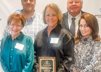 In this photo -Receiving the Program Excellence Award for Best Health & Life Skills Program in Tennessee from Boys & Girls Clubs of America are board members and staff of the boys & Girls Club of Greeneville & Greene County including Carla Bewley, Rebecca Tipton & Cindy Heavener in the front row and Scott Bullington and Eddie Yokley in the back row
