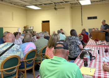 A crowd of over 60 concerned citizens gathered at the old Greystone School Tuesday night to voice concerns and organize opposition to a proposed rezoning and expansion of Vulcan Materials' mining operation in the community.