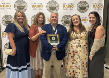 News Director Bobby Rader, with wife Pam; and Mischelle Johnson Young; and daughters, Courtney, and Bethany.
