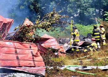 Firefighters working to bring the Monday fire under full control (Photo from Newmansville VFD)