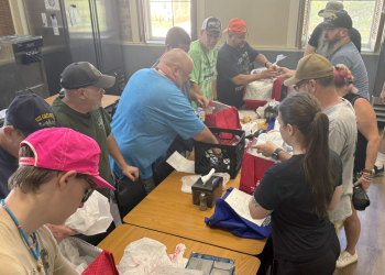 Dozens of USS former Greeneville sailors and their family members volunteered their time to give back to the community on Thursday. The sailors beautified Bicentennial Park and packed meals for Meals on Wheels.