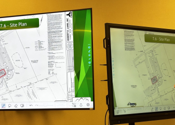 Planning Administrator Justin Schooley outlines plans for the office addition on the GEA property on West Andrew Johnson Highway