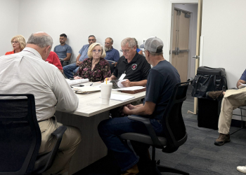 Property owner Brian Ede, right, speaks to the County Planning Commission about a cabin resort concept on Tuesday afternoon.
