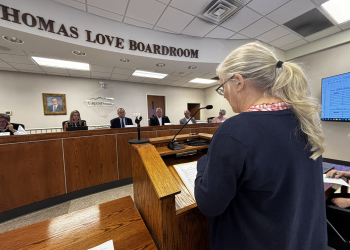 LIbrary Director Erin Evans discusses improvement needs at the T. Elmer Cox Library.