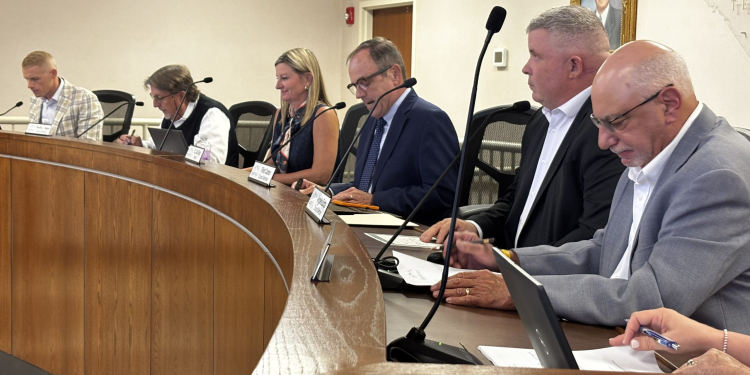 (R-L) New City Council members Angelo Botta and Flint Carter, along side Mayor Cal Doty, Interim City Manager Cathy Osborne and Councilmen Tim Teague and Dr. Matt Hensley.