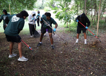 Tusculum students help clean property in the community