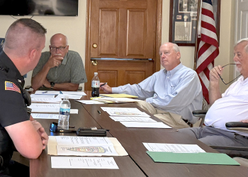 Tusculum Police Sergeant Josh Kyker discusses Genetec automated license plate readers with the Tusculum Board of Mayor and Commissioners on Monday. The Tusculum Police Department has been using the cameras on a trial basis, and the board will consider a yearlong contract for the cameras in October.