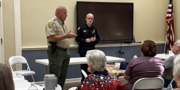 Sheriff David Beverly and Police Chief Josh Pierce address Roby members Thursday.